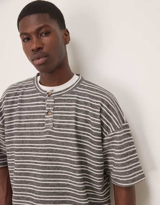 Camiseta a rayas extragrande con cuello panadero y hombros caídos de canalé de ASOS DESIGN, 4 de 4