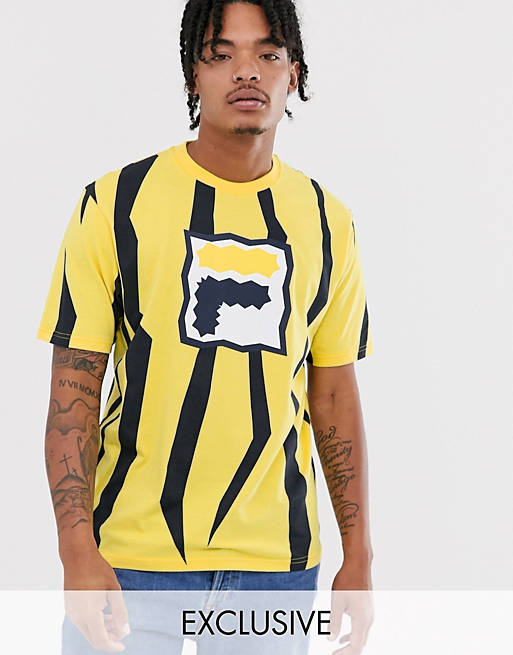 Colonos detalles abajo Camiseta amarilla con diseño en zigzag exclusiva en ASOS Mob de Fila | ASOS