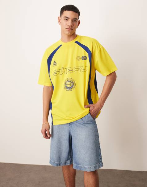 Camiseta amarilla extragrande con estampado gráfico deportivo y diseño de paneles de ASOS DESIGN - view 1