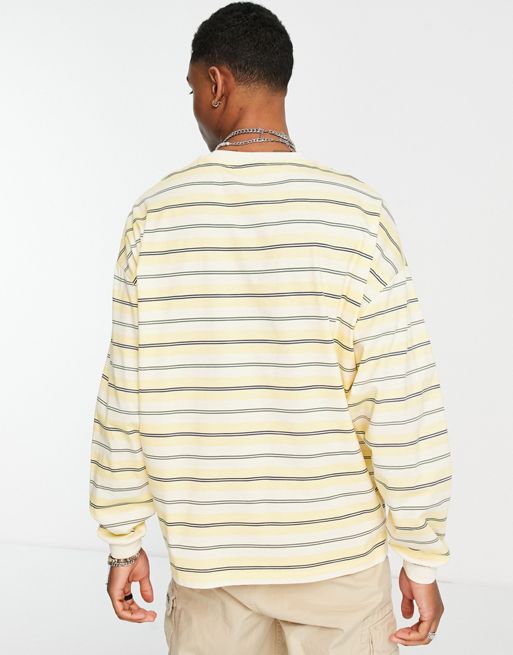 Camiseta amarilla de manga larga en tejido orgánico a rayas con diseño  elástico y mangas en contraste de ASOS DESIGN