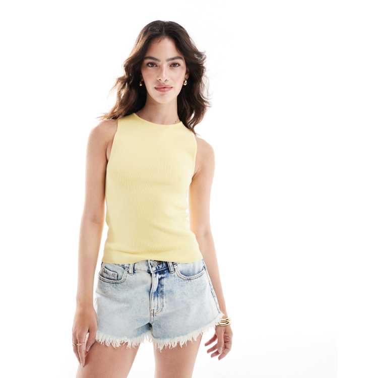 Camiseta amarilla sin mangas con cuello cerrado de Mango ASOS