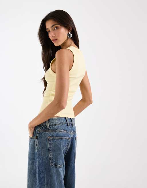 Camiseta amarillo crema sin mangas con detalle de botones de ASOS DESIGN, 4 de 4