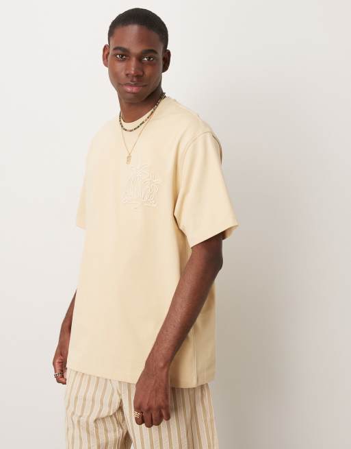 Camiseta amarillo pastel con estampado de palmeras de Mango ASOS