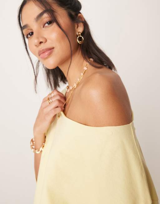 ASOS DESIGN slouchy off shoulder oversized tee in buttermilk