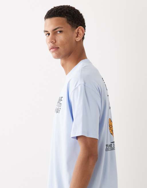 Camiseta azul claro con estampado en la espalda Swoosh Sounds de Nike, 4 de 5