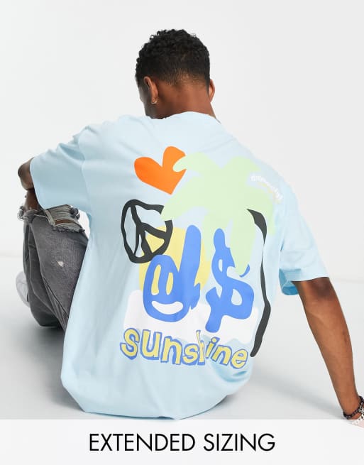 Camiseta azul claro extragrande con estampado gráfico de palmera en la espalda de ASOS Daysocial