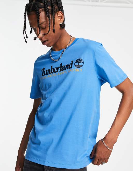 Camiseta azul con diseño gráfico en la parte delantera de Timberland