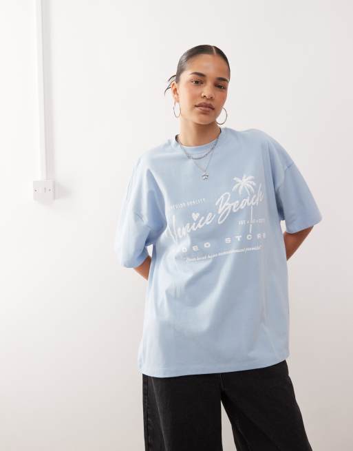 Camiseta azul con estampado gráfico "Venice Beach" de tejido grueso de COLLUSION, 4 de 4