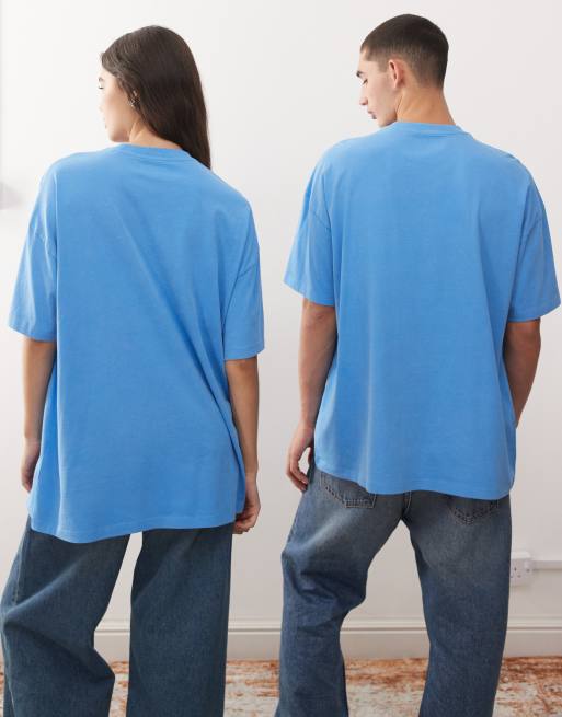 Camiseta azul con logo blanco estampado en la parte central del pecho de COLLUSION Unisex, 4 de 4