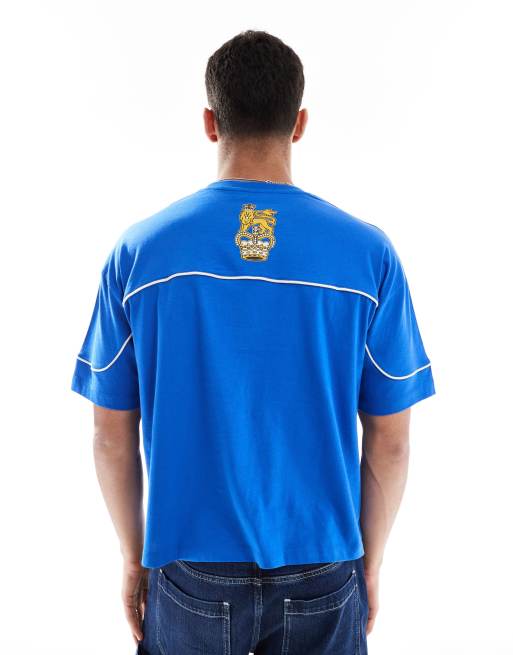 Camiseta azul de corte cuadrado extragrande con estampado gráfico deportivo de ASOS DESIGN, 2 de 4
