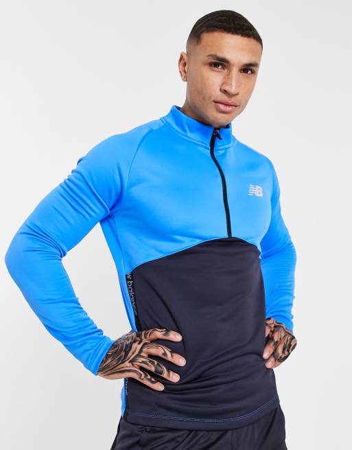 Camiseta azul deportiva con diseño color block de New Balance Football