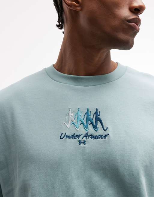Camiseta azul esmalte deportiva con estampado gráfico en la espalda de Under Armour, 2 de 5