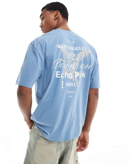 Camiseta azul extragrande con estampado de querubín y texto 