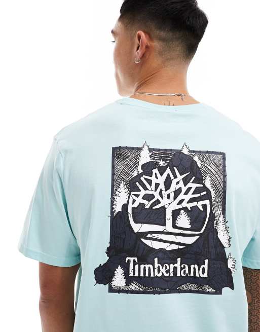 Camiseta azul extragrande con logo de árbol camuflado estampado en la espalda de Timberland