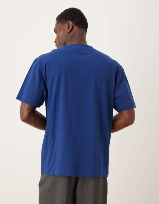 Camiseta azul holgada con estampado gráfico de París de ASOS DESIGN, 3 de 5