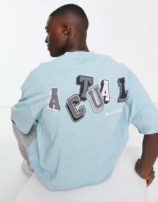Camiseta azul lavado extragrande con logo estampado de ASOS Actual