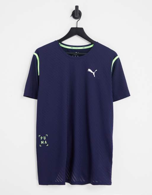 Camiseta azul marino a rayas con detalles amarillos de PUMA Training