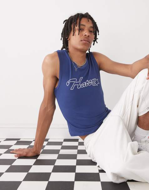 Camiseta azul marino ajustada sin mangas para festivales con texto "Hater" de COLLUSION - view 1
