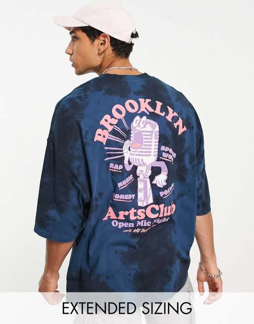Camiseta azul marino extragrande con efecto tie dye y estampado en la espalda de mezcla de algodón orgánico de ASOS DESIGN