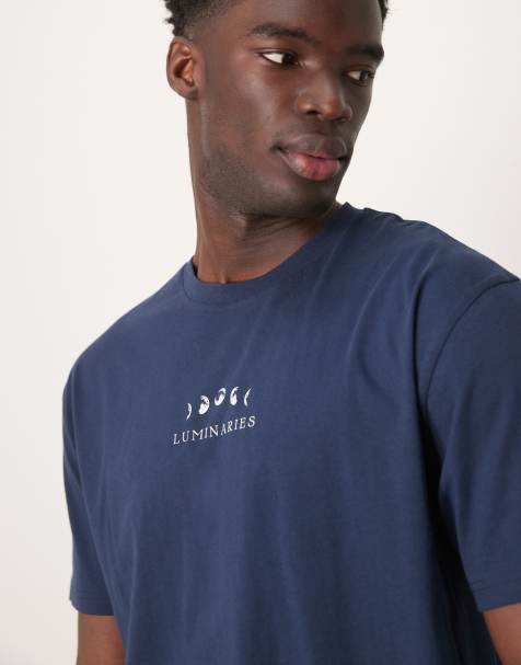 Camiseta azul marino holgada con estampado celestial en el pecho de ASOS DESIGN - view 1