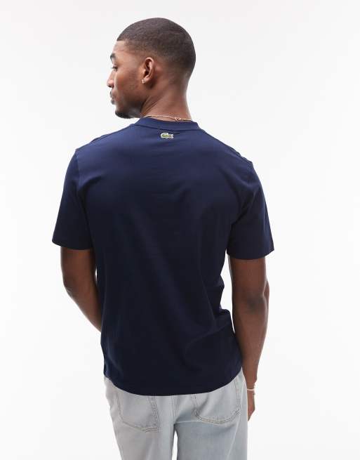 Camiseta azul marino holgada con logo estampado en la parte central del pecho de Lacoste, 4 de 4