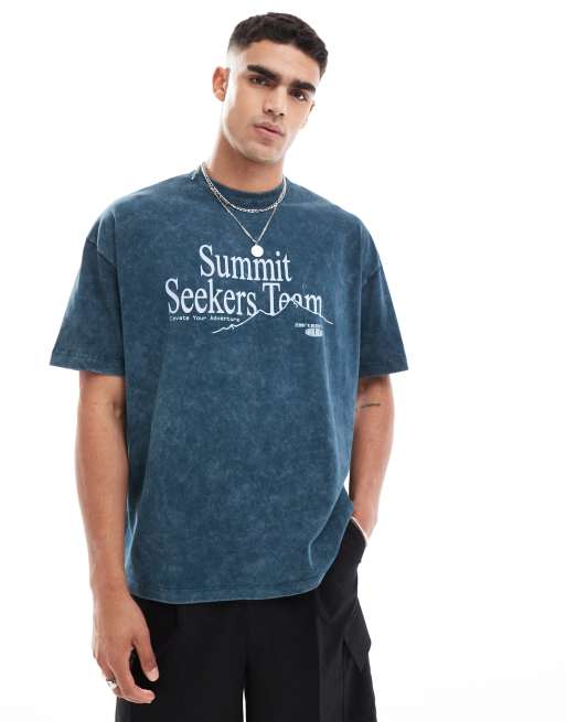 Camiseta azul marino lavado extragrande con estampado de texto en la parte delantera de ASOS DESIGN