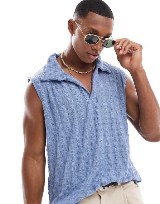 Camiseta azul sin mangas con cuello tipo polo de tejido texturizado de ASOS DESIGN