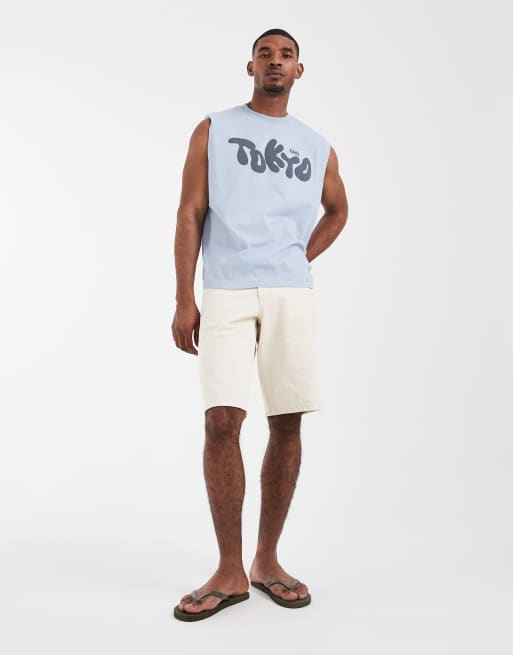 Camiseta azul sin mangas de corte cuadrado extragrande con estampado gráfico "Tokyo" efecto burbuja de ASOS DESIGN, 4 de 5