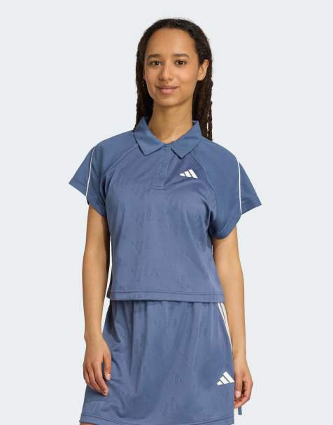 Camiseta azul tinta envejecido y blanco hueso de estilo tenista con cuello tipo polo, patrón de jacquard y 3 rayas Stadium de adidas Performance - view 1