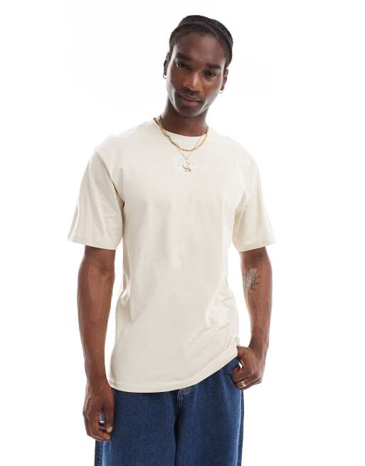 Camiseta beis claro con logo de firma Essentials de Karl Kani