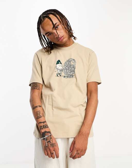 Camiseta beis con diseño de persona comprando de Carhartt WIP