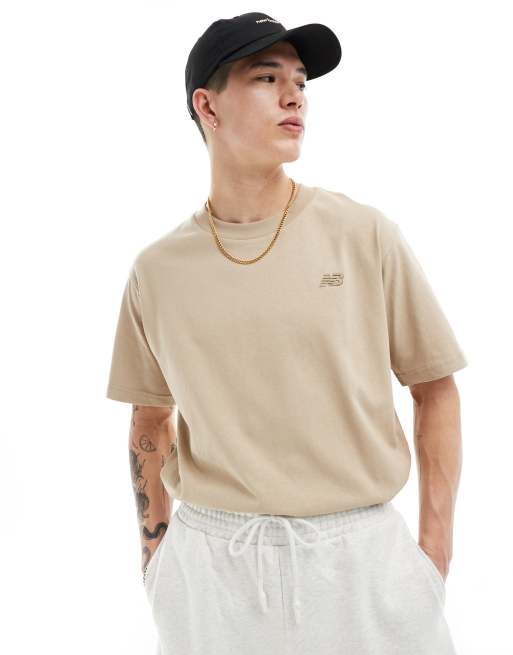 Camiseta beis de algodón de New Balance Athletics