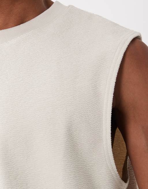 Camiseta beis extragrande sin mangas de tejido muy grueso texturizado de ASOS DESIGN, 3 de 5