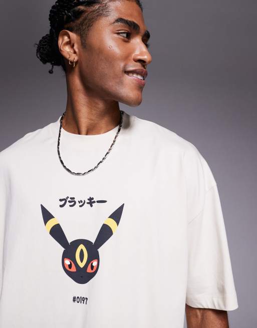 Camiseta beis extragrande unisex con estampados de Umbreon de "Pokémon" de ASOS DESIGN