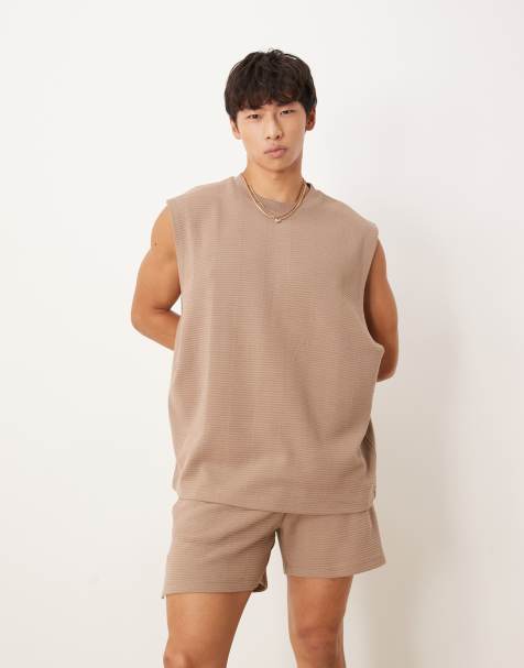 Camiseta beis sin mangas extragrande de canalé de ASOS DESIGN - view 1