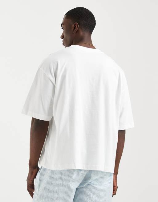 Camiseta blanca de corte cuadrado extragrande con estampado gráfico en la espalda de ASOS DESIGN, 5 de 5