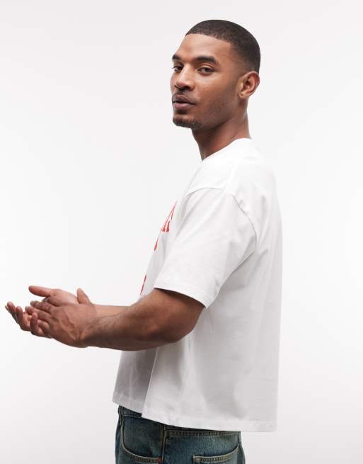 Camiseta blanca de corte cuadrado extragrande con gráfico de estilo cowboy de ASOS DESIGN, 5 de 5