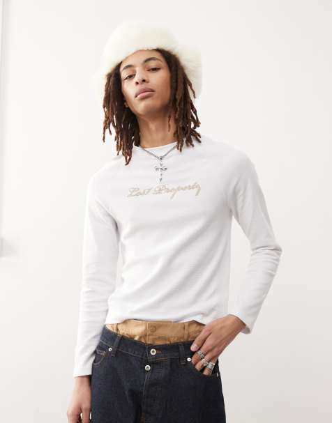 Camiseta blanca de corte slim y manga larga con detalle de cadeneta de tejido gofrado de COLLUSION - view 1