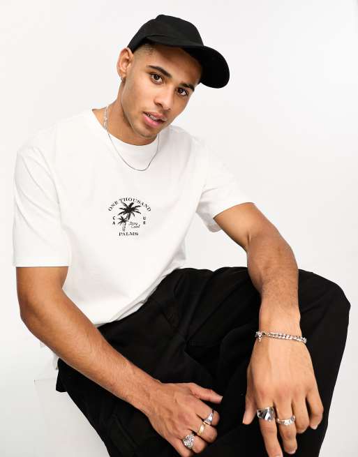 Camiseta blanca extragrande con estampado de palmeras en el pecho de Only & Sons