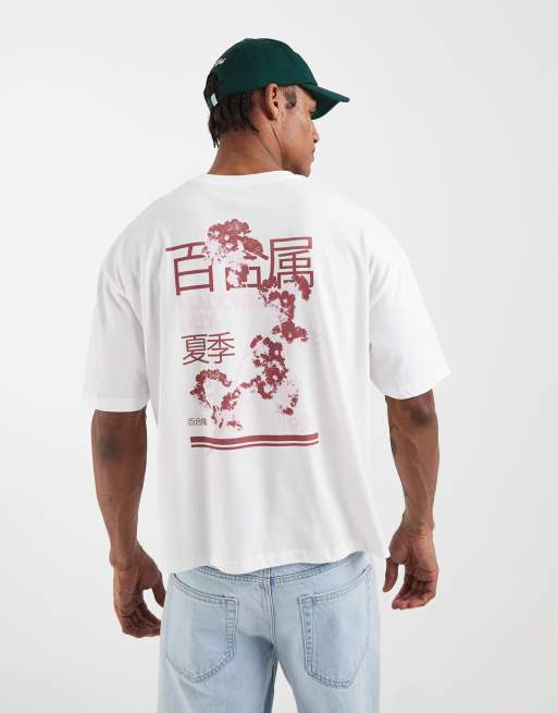 Camiseta blanca extragrande con estampado gráfico de flor de cerezo de ASOS DESIGN, 4 de 5