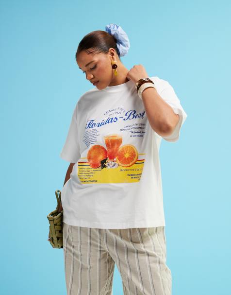 Camiseta blanca extragrande con estampado gráfico de zumo de naranja de ASOS DESIGN Curve - view 1