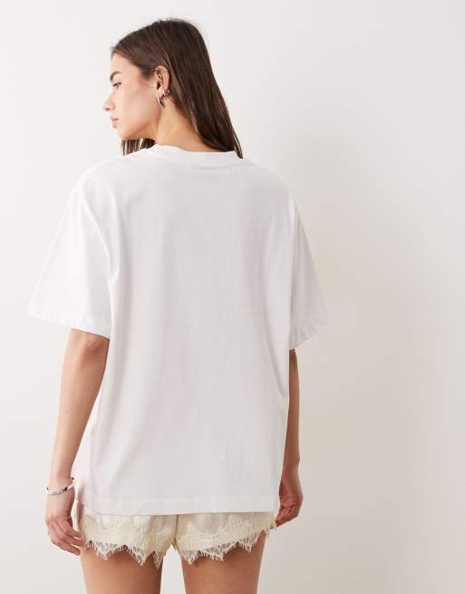 Camiseta blanca extragrande con estampado gráfico "New York Marathon" de ASOS DESIGN, 3 de 4