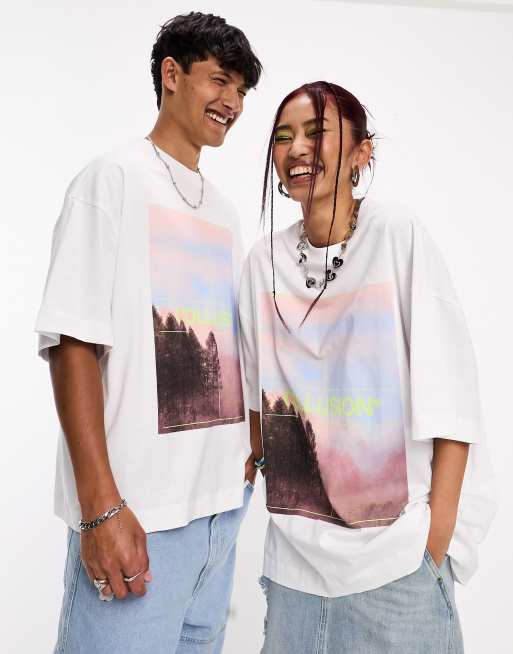 Camiseta blanca extragrande con estampado gráfico rosa de cielo de COLLUSION Unisex