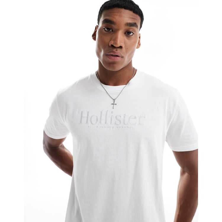 Camiseta blanca holgada con detalle del logo de Hollister RcjShops