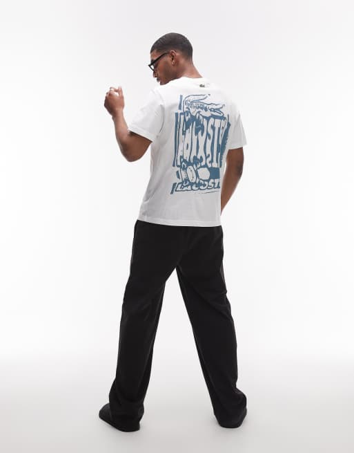 Camiseta blanca holgada con estampado gráfico en el pecho y la espalda de Lacoste, 2 de 4