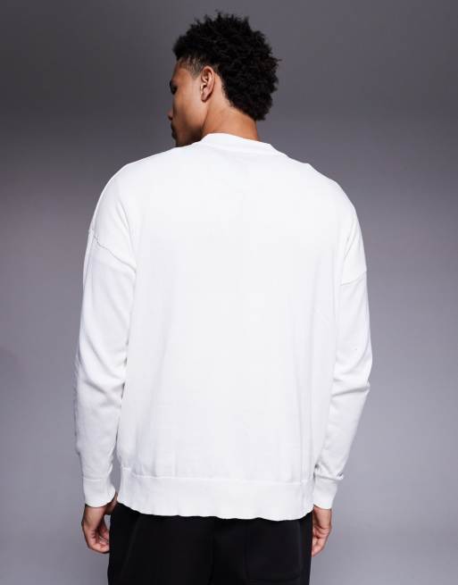 Camiseta blanca holgada de manga larga con cuello subido de punto de ASOS DESIGN, 3 de 5