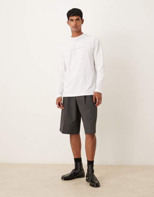 Camiseta blanca holgada de manga larga con estampado en el pecho de ASOS DESIGN, 2 de 5