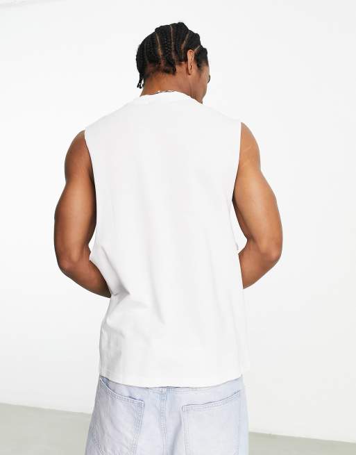 Camiseta blanca holgada sin mangas con sisas caídas de piqué de ASOS DESIGN, 3 de 4