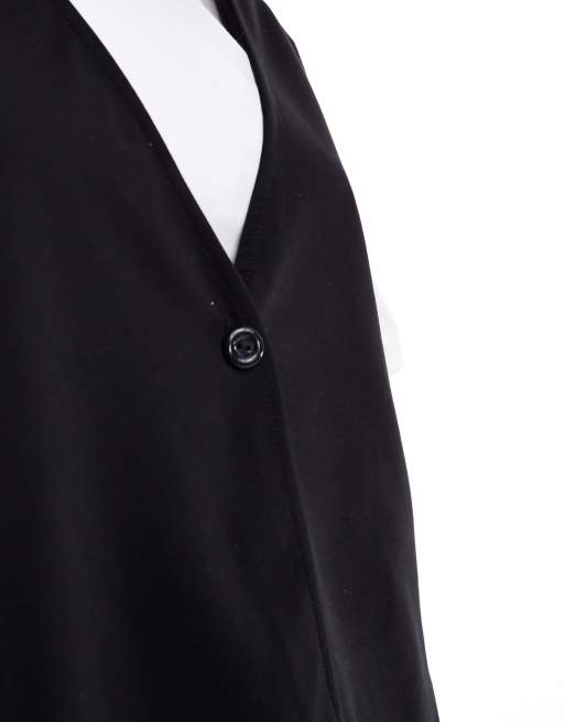 Camiseta blanca y chaleco negro con diseño 2 en 1 de ASOS DESIGN, 3 de 4