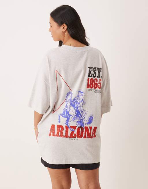 Camiseta blanco hielo jaspeado extragrande con estampado gráfico de rodeo Arizona de ASOS DESIGN Curve